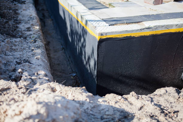 Professional Basement Waterproofing technician working in Radnor, OH